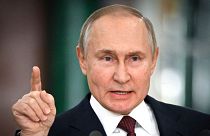 Russian President Vladimir Putin gestures while speaking at a news conference following a meeting of the State Council at the Kremlin in Moscow, Russia on Dec. 22, 2022.