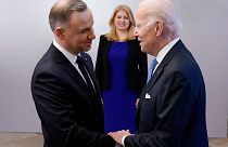 President Joe Biden, right, is greeted by Polish President Andrzej Duda, Feb. 22, 2023, at the Presidential Palace in Warsaw. 