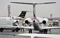 Planes are parked at a private jet terminal at Harry Reid International Airport ahead of the Super Bowl, 1 February 2024, in Las Vegas.