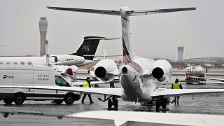 Planes are parked at a private jet terminal at Harry Reid International Airport ahead of the Super Bowl, 1 February 2024, in Las Vegas.