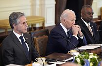 President Joe Biden listens with Secretary of State Antony Blinken and Defence Secretary Lloyd Austin as he meets with Polish President Andrzej Duda