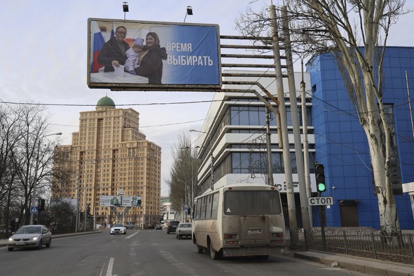 A billboard reading: "Time to vote" is seen in a street in Donetsk of Russian-controlled Donetsk region, eastern Ukraine