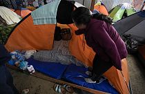 refugees in tent 