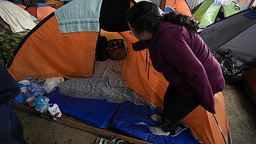 refugees in tent 