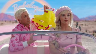This image released by Warner Bros. Pictures shows Ryan Gosling, left, and Margot Robbie in a scene from "Barbie."