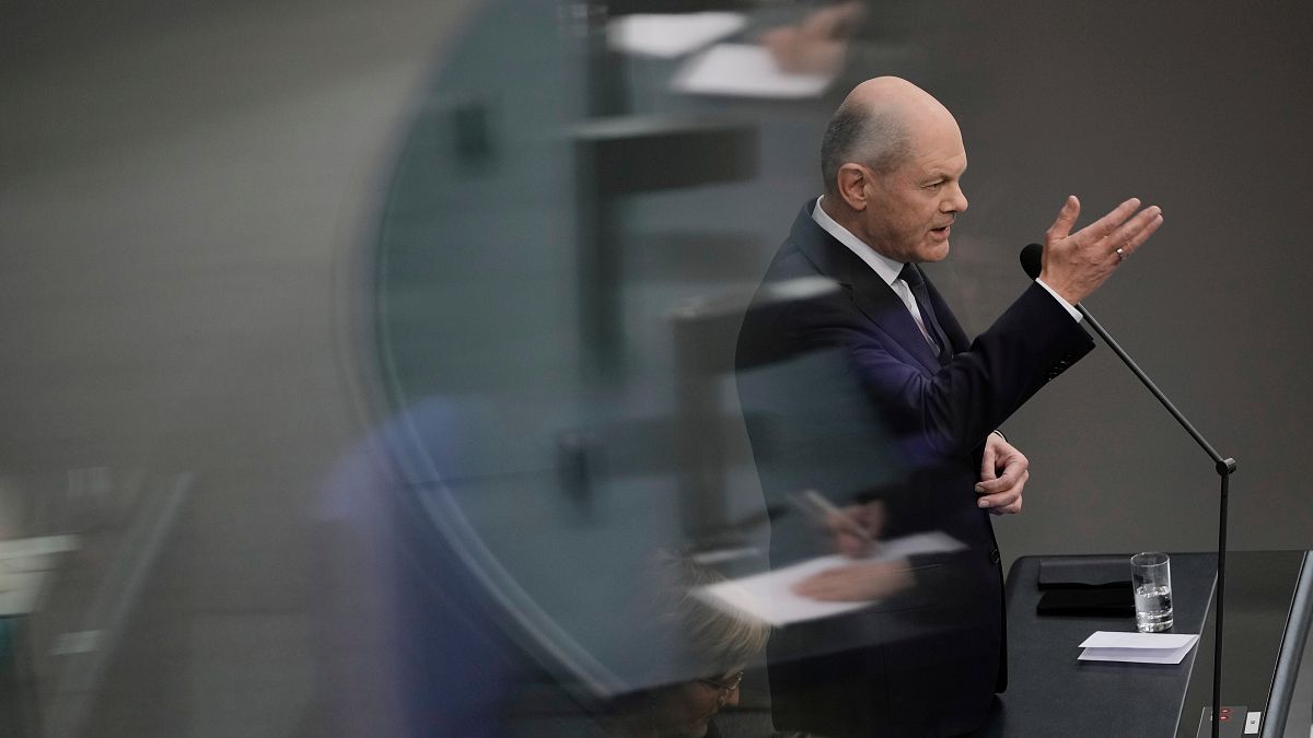 German Chancellor Olaf Scholz answers questions from lawmakers at the Bundestag in Berlin.