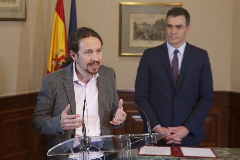 Em 2019, Pablo Iglesias assinou um acordo de coligação com o líder socialista espanhol e então primeiro-ministro interino Pedro Sanchez.