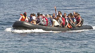 Migrant boat sinks off Turkey's coast, killing at least 21 people