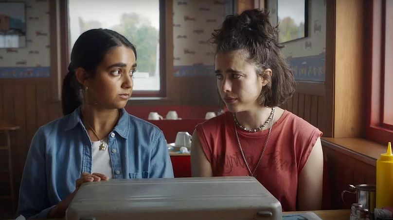 Geraldine Viswanathan and Margaret Qualley in 'Drive-Away Dolls'