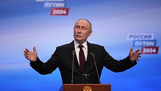 Russian President Vladimir Putin gestures while speaking on a visit to his campaign headquarters after a presidential election in Moscow, Russia, early Monday, March 18, 2024.