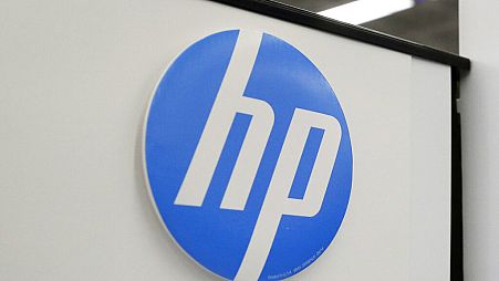 In this May 24, 2016, file photo, Hewlett-Packard products are on display at a store in North Andover, Mass.