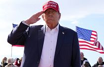  Republican presidential candidate former President Donald Trump salutes at a campaign rally 16 March, 2024, in Vandalia, Ohio.