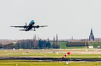 A plane takes of at Brussels Zaventem airport. The EU is banking on biofuels to help reduce the growing climate impact of the aviation industry.