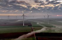Fog floats over a wind energy plant near Stetten, some 20 kilometres north of Kaiserslautern, Germany, as the sun rises on Tuesday, March 19, 2024.