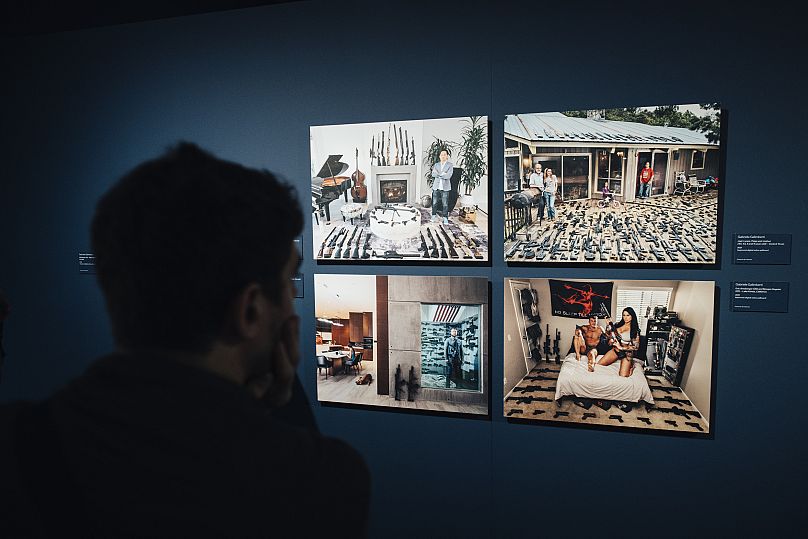 A visitor looking at Gabriele Galimberti's photos at the "Suburbia. Building the American Dream" exhibition in Barcelona.