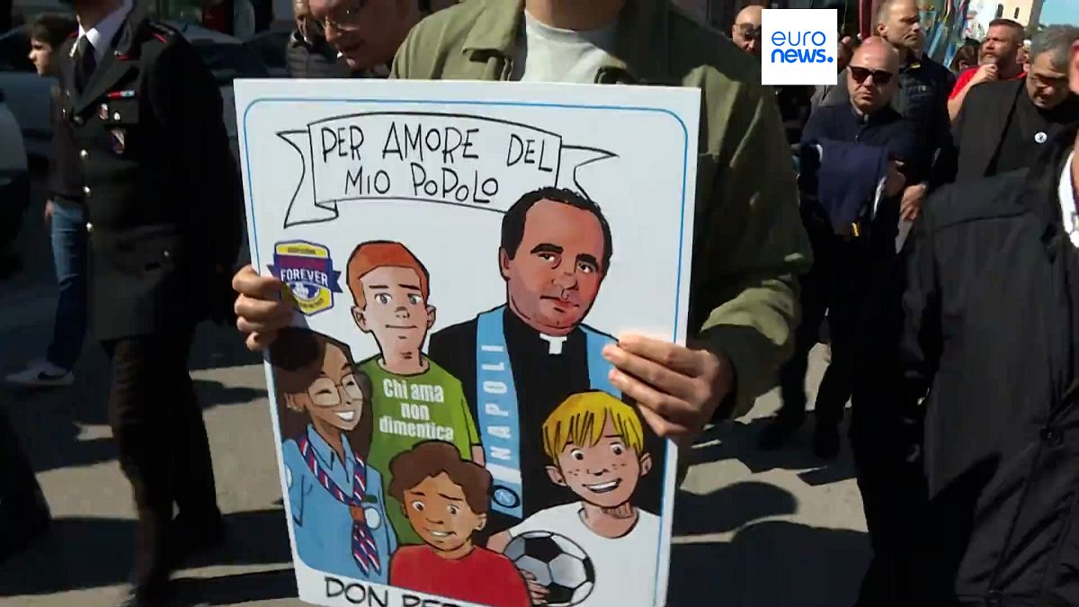 Thousands gather in Naples to pay tribute to Don Peppe Diana. 