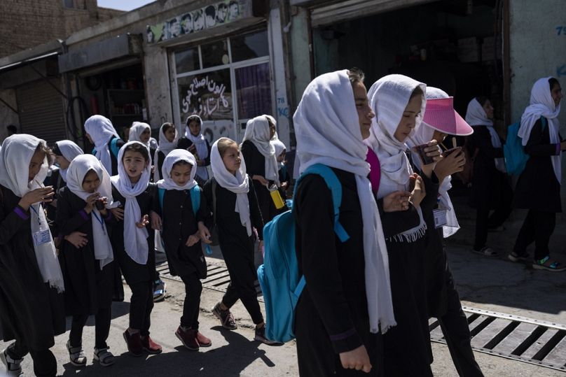 Students walk together from school in Kabul, Afghanistan.
