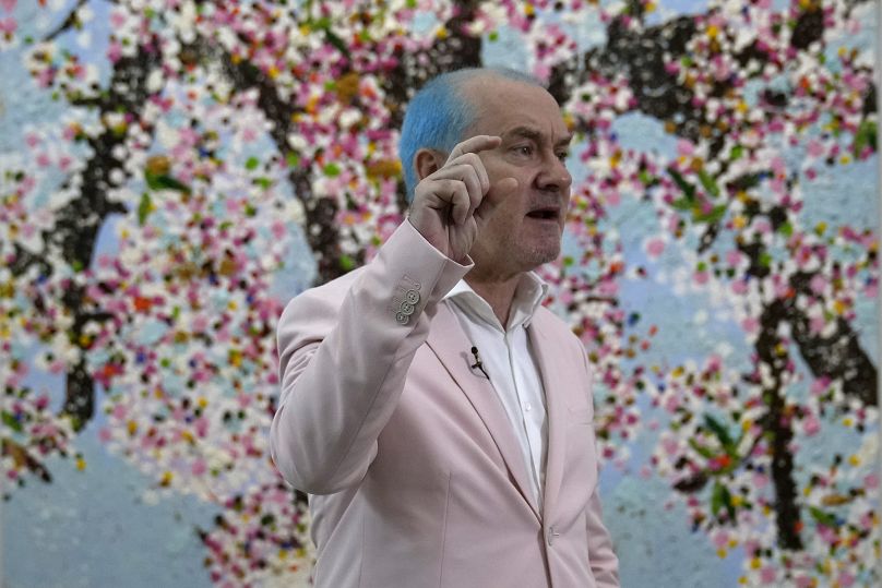 Damien Hirst attends the opening of his new show "Cherry Blossoms" at the Cartier Foundation for Contemporary Art in Paris Friday, July 2, 2021