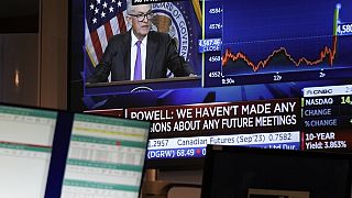 Fed Chairman Jerome Powell's news conference is displayed on a monitor on the floor at the New York Stock Exchange in New York, Wednesday, July 26, 2023.