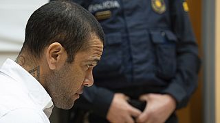 Brazilian footballer Dani Alves sits during his trial in Barcelona, Spain, Monday, Feb. 5, 2024.