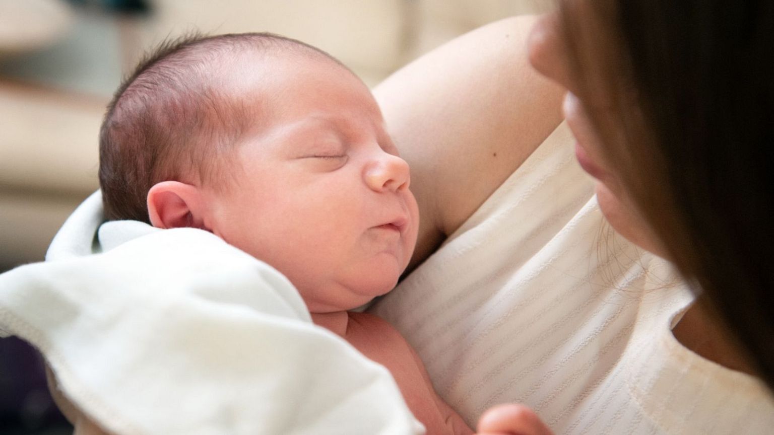 A newborn baby is pictured.