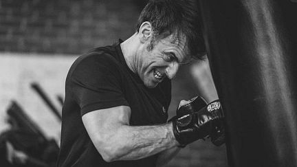 The art of the political portrait: Emmanuel Macron boxing photos flaunt his strength | Euronews