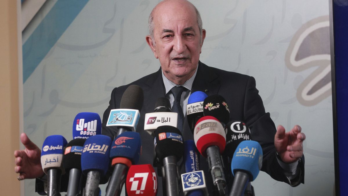  Algeria's President Abdelmajid Tebboune gives a press conference, in Algiers, Algeria, Sunday, 24, 2019.