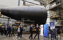 UK, US and Australian officials during a visit to the Osborne Naval Shipyard in Adelaide, Australia, Friday, March 22, 2024.