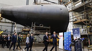 UK, US and Australian officials during a visit to the Osborne Naval Shipyard in Adelaide, Australia, Friday, March 22, 2024.
