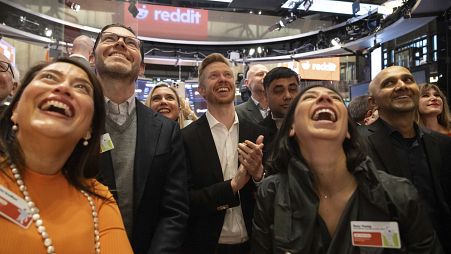 Reddit CEO Steve Huffman and company employees celebrate on the New York Stock Exchange trading floor, prior to his company's IPO. March. 21, 2024. 