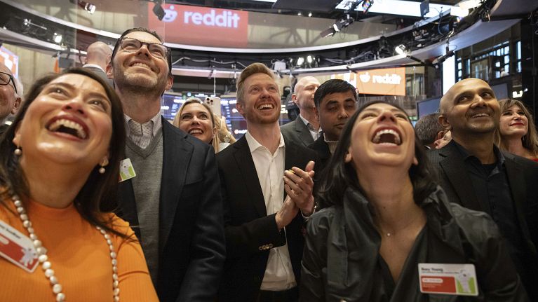 Reddit CEO Steve Huffman and company employees celebrate on the New York Stock Exchange trading floor, prior to his company's IPO. March. 21, 2024. 