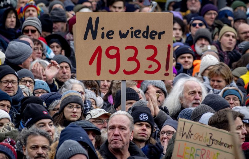 People gather to protest the far-right Alternative for Germany, or AfD party, and right-wing extremism in Frankfurt am Main, January 2024