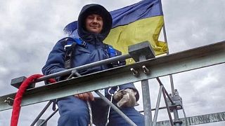 An engineer from Kramatorsk working on the top of newly reconnected base station in Eastern Ukraine