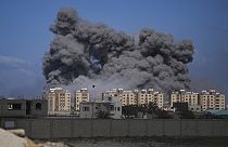 Smoke rises following an Israeli airstrike in the central Gaza Strip, Friday, March 22, 2024.