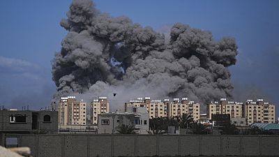 Smoke rises following an Israeli airstrike in the central Gaza Strip, Friday, March 22, 2024.