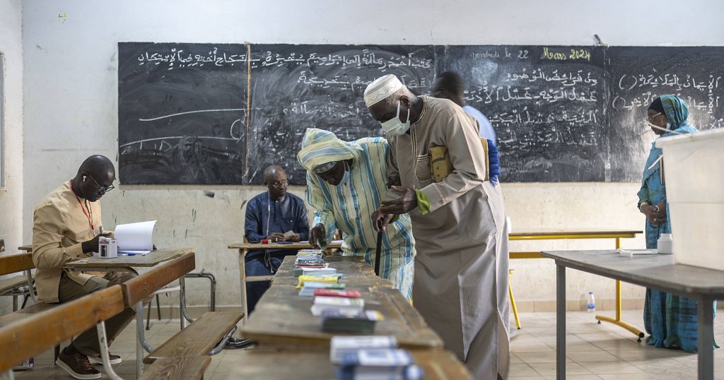 Senegalese call for peace during vote after months of chaotic politics