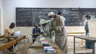 Senegalese call for peace during vote after months of chaotic politics
