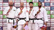 Медалисты в весовой категории свыше 100 кг: Ушанги Кокаури, Гурам Тушишвили, Саба Инанеишвили и Энди Гранда