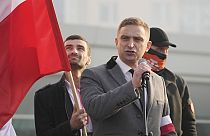 Robert Bakiewicz parla all'inizio della marcia annuale per la Giornata dell'indipendenza polacca, Varsavia, 11 novembre 2021
