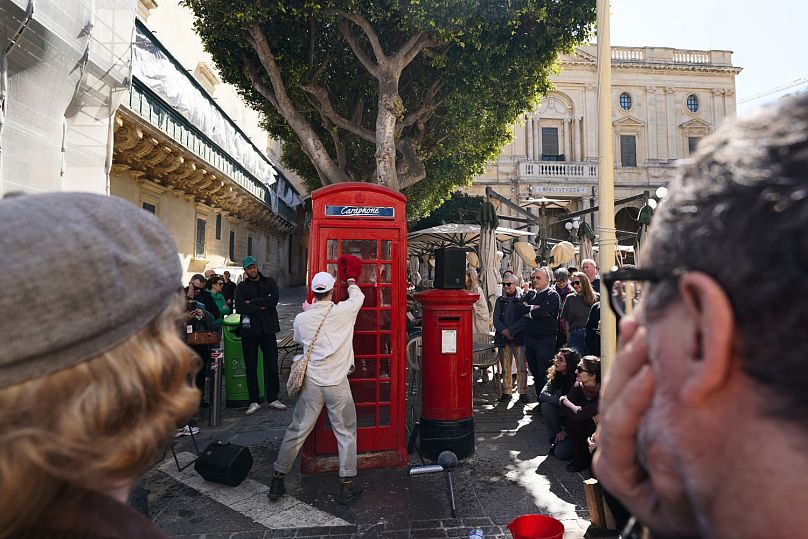A performance by Franco-Maltese duo Keit Bonnici and Niels Plotard involved an artist washing a red telephone booth in the centre of Valletta.