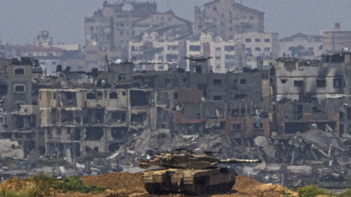 Israeli soldiers on a tank on a position on the border with Gaza Strip, in southern Israel,  March 19, 2024