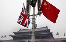 British and Chinese national flags are seen on display in front of the Tiananmen Gate in Beijing, China, Jan. 17, 2008. 