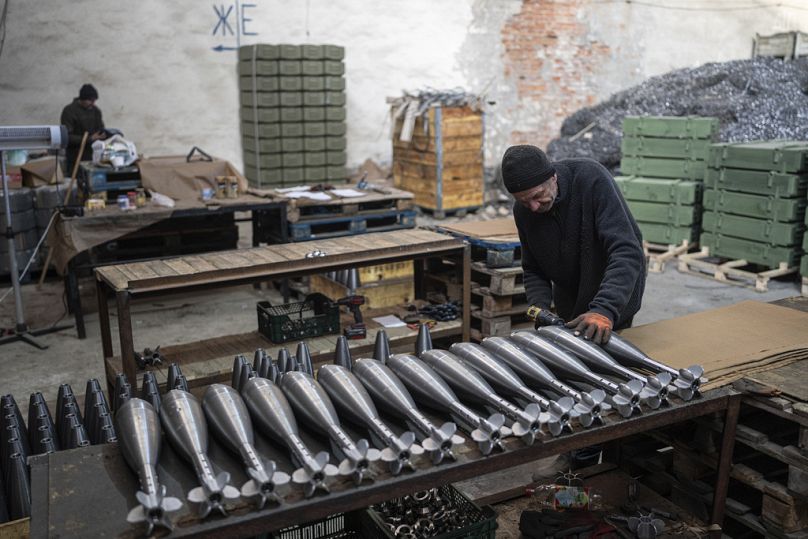 A worker assembles mortar shells at a factory in Ukraine, on Wednesday, January 31, 2024.