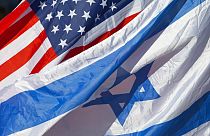 FILE - US and Israeli flags fly as US Secretary of State John Kerry arrives in Tel Aviv, Israel, Tuesday, Nov. 24, 2015.