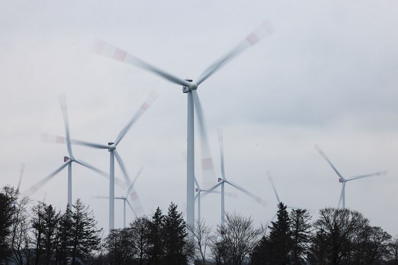 Wind turbines turn at a wind farm in Sprakebuell, Germany.