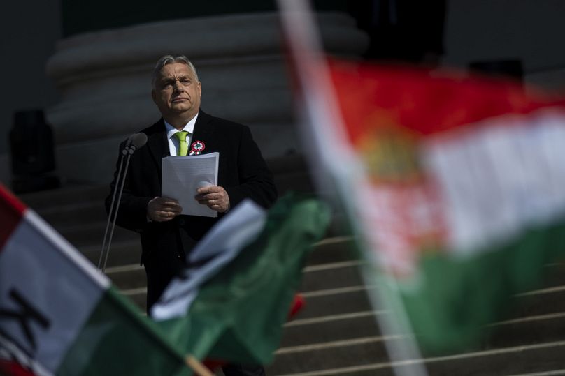 Hungarian Prime Minister Viktor Orbán gives a speech on the steps of the National Museum in Budapest.