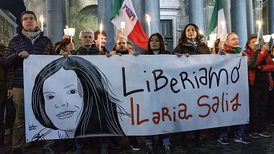 Demonstrators hold up a banner with writing (Italian) "Lets free Ilaria Salis", in front of the Pantheon monument, in Rome, ON Feb. 14, 2024. 