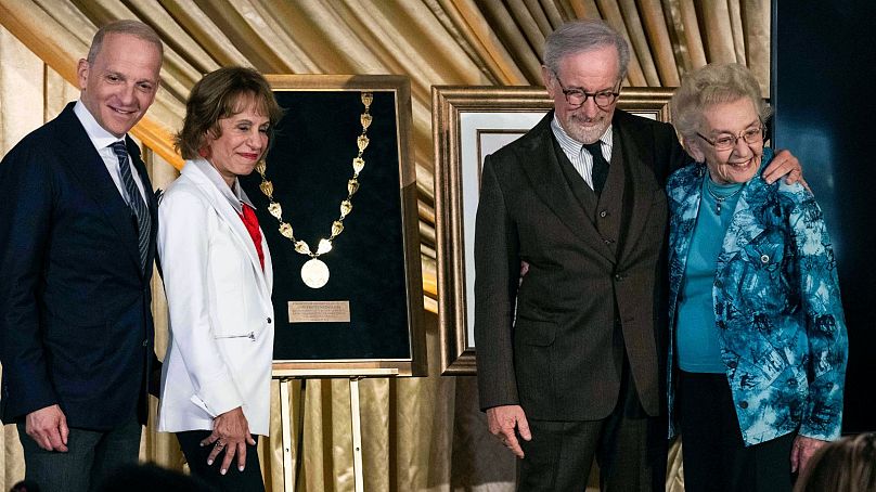 Left to right: Joel Citron, University of Southern California President Carol Folt, Steven Spielberg, and Holocaust survivor Celina Biniaz - pose with the USC Medallion
