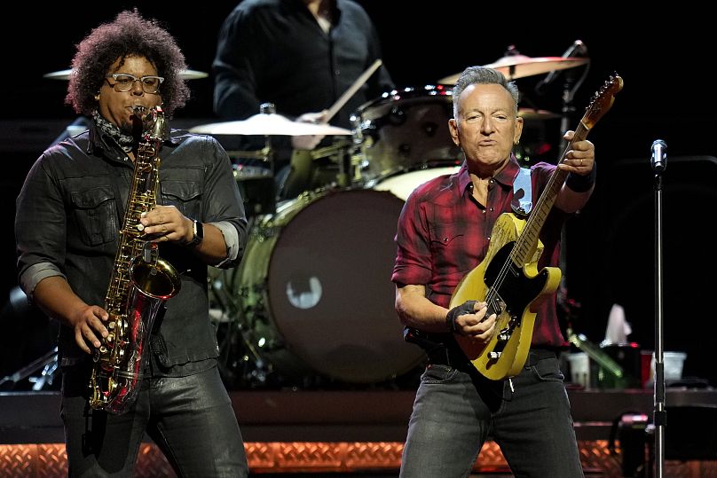 Bruce Springsteen, right, alongside Jake Clemons on stage during a concert of Bruce Springsteen and The E Street Band World Tour 2024 performance - 19 March 2024