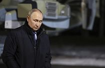 Vladimir Putin stands near a helicopter in Torzhok, Tver region, 217 km (136 miles) north-west of Moscow, Russia, Wednesday, March 27, 2024.